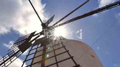 low angle windmill and clouds time lapse zoom 11213