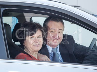woman and man in car