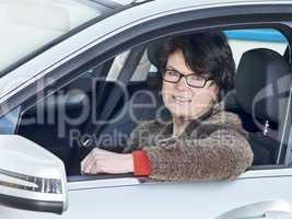 woman sitting in car