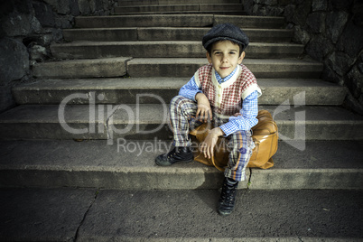 Exterior stairs and child with vintage bag