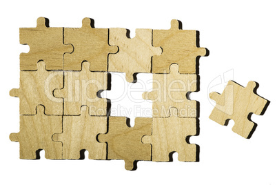 Wooden puzzle on white background.