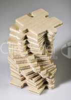 Wooden puzzle on white background.