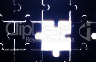 Wooden puzzle and backlight background
