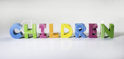 Multicolored text children made of wood.