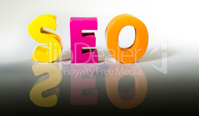 Multicolored word seo made of wood.