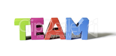 Multicolored word team made of wood.