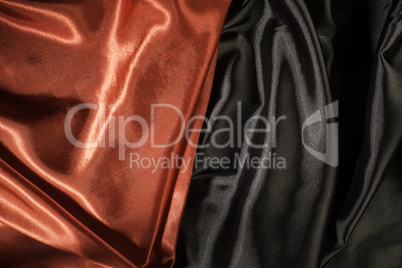 Shiny black and red satin fabric