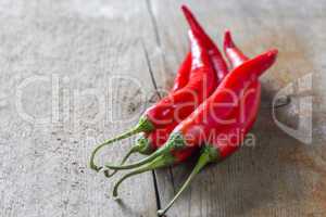 chillies on wooden table