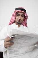 arab man reading investment profit