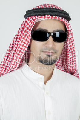 young arab portrait wearing sun glasses