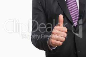 Mid section of a businessman gesturing thumbs up