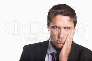 Close-up of a young worried businessman