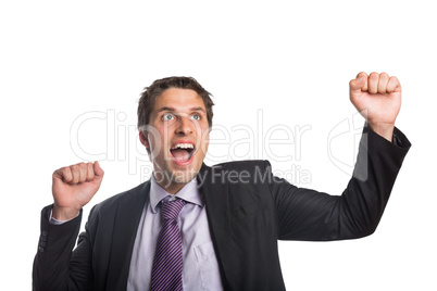 Cheerful businessman cheering as he looks up