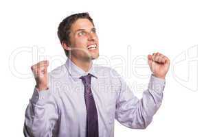 Elegant businessman cheering with clenched hands against white b