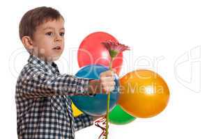 boy with balloons and flower