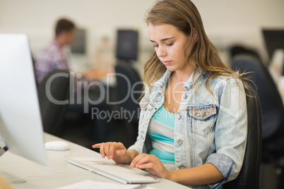 Focused student studying in the computer room