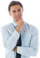 Thinking businessman with hand on chin