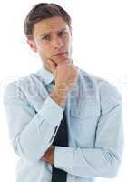 Thinking businessman with hand on chin