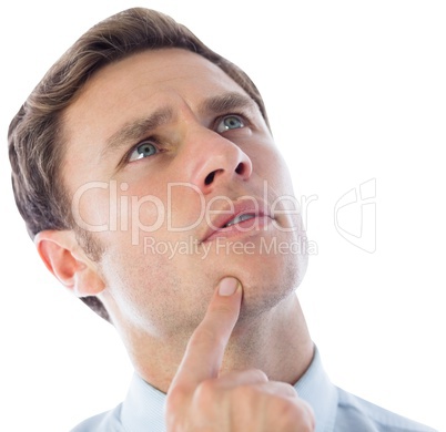 Thinking businessman with finger on chin