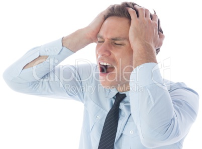 Stressed businessman with hands on head