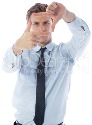 Businessman making frame with hands