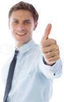 Businessman showing thumbs up