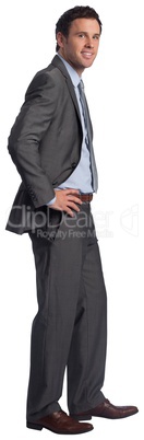 Smiling businessman with hands on hips