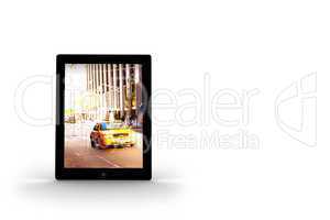 Yellow taxi on tablet screen