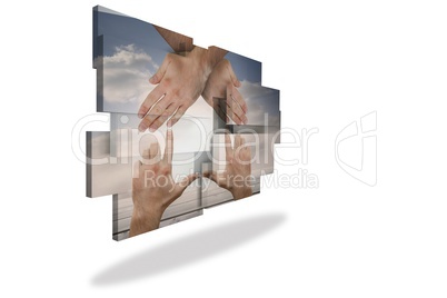 Hands making a house on abstract screen