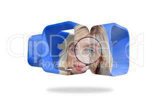 Blonde holding magnifying glass on abstract screen