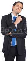 Thinking businessman holding pen