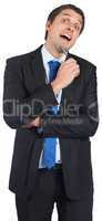 Thinking businessman holding pen