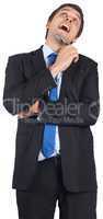 Thinking businessman holding pen