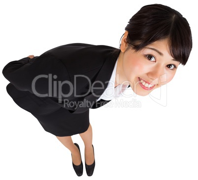 Smiling businesswoman bending