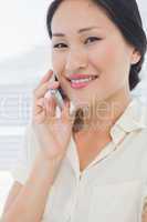 Beautiful businesswoman using cellphone