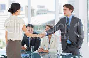 Handshake to seal a deal after a job recruitment meeting