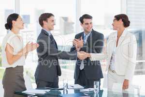 Handshake to seal a deal after a job recruitment meeting