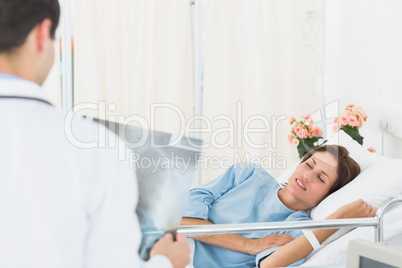 Doctor visiting patient in the hospital