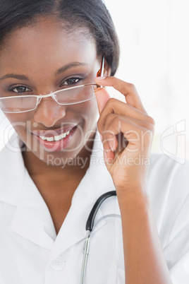 Close-up portrait of a female doctor with eye glasses