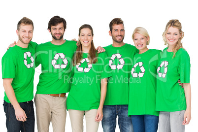 Group portrait of people wearing recycling symbol t-shirts