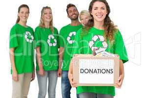 People in recycling symbol t-shirts with donation box
