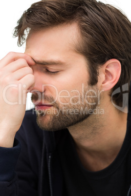 Close-up of a stressed handsome young man