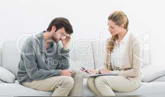 Young man in meeting with a financial adviser