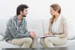 Young man in meeting with a financial adviser