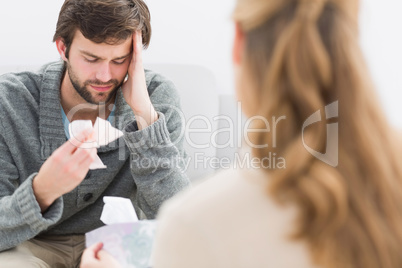 Man in meeting with a financial adviser