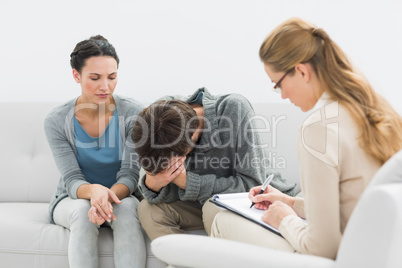 Couple in meeting with a financial adviser