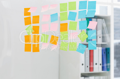 Close-up of colorful sticky notes at office