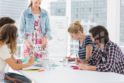 Casual business people in office at presentation