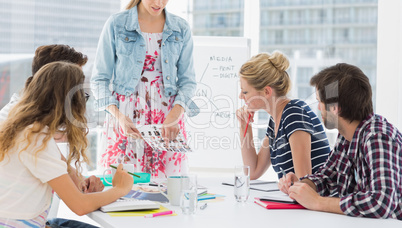 Casual business people in office at presentation