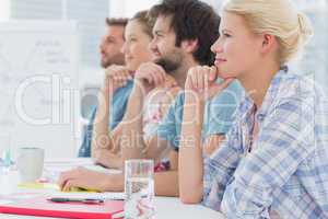 Artists in row during meeting at office